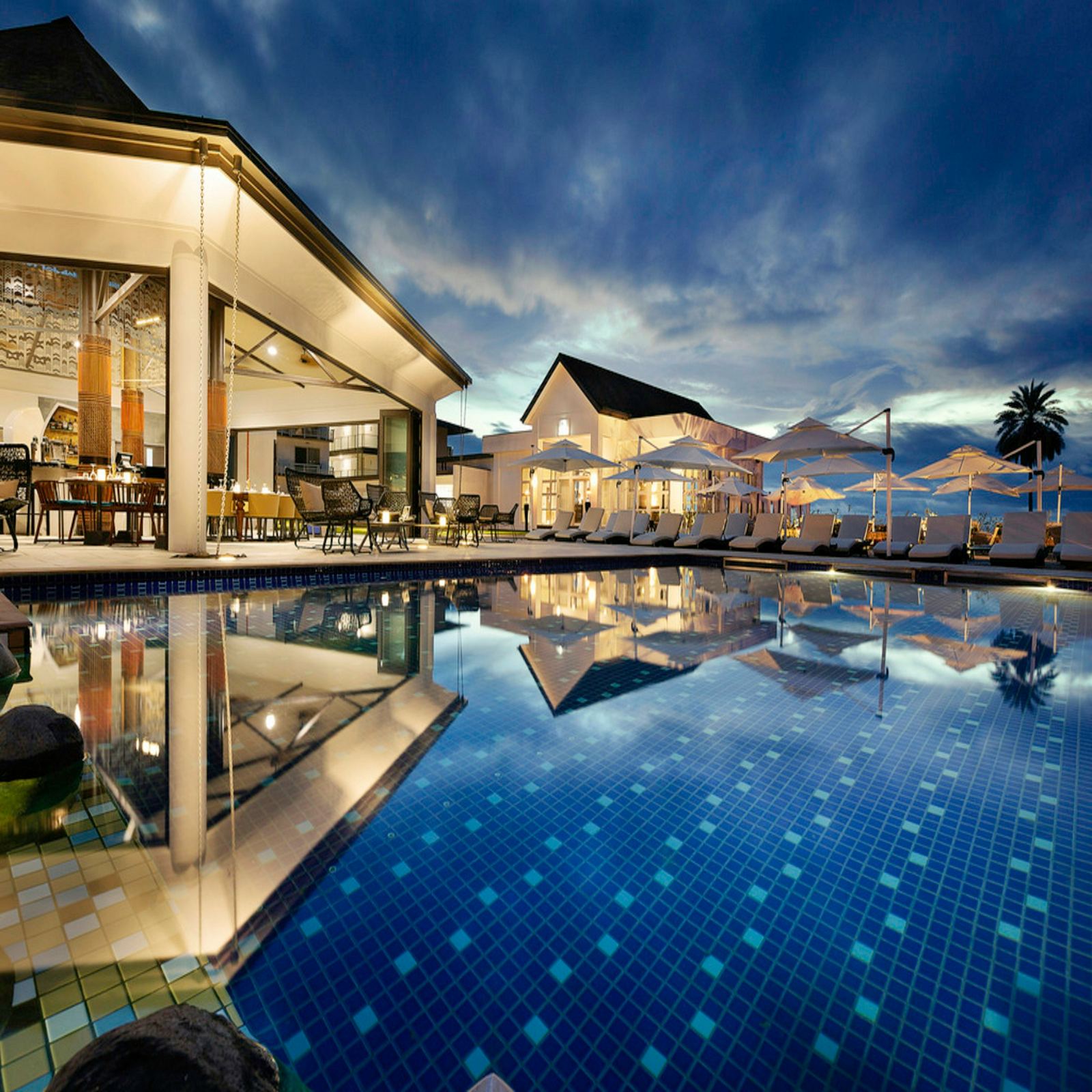 A hotel resort pool where guests use WifiSpot guest Wi-Fi
